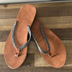 Worn once, Plaka size 9 sandal, with grey strap and camel color foot bed.
